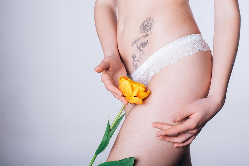 girl-white-lingerie-with-flower-white-background-women-s-health-idea_190302-963